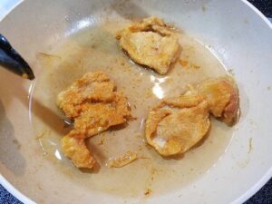 Rendering chicken fat in a pan